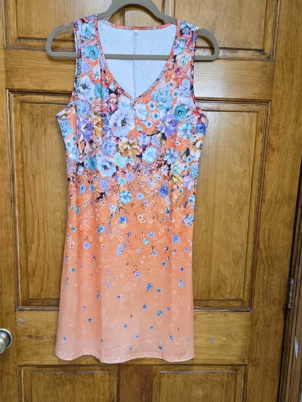 Sleeveless V-Neck Mini Dress in Coral Floral